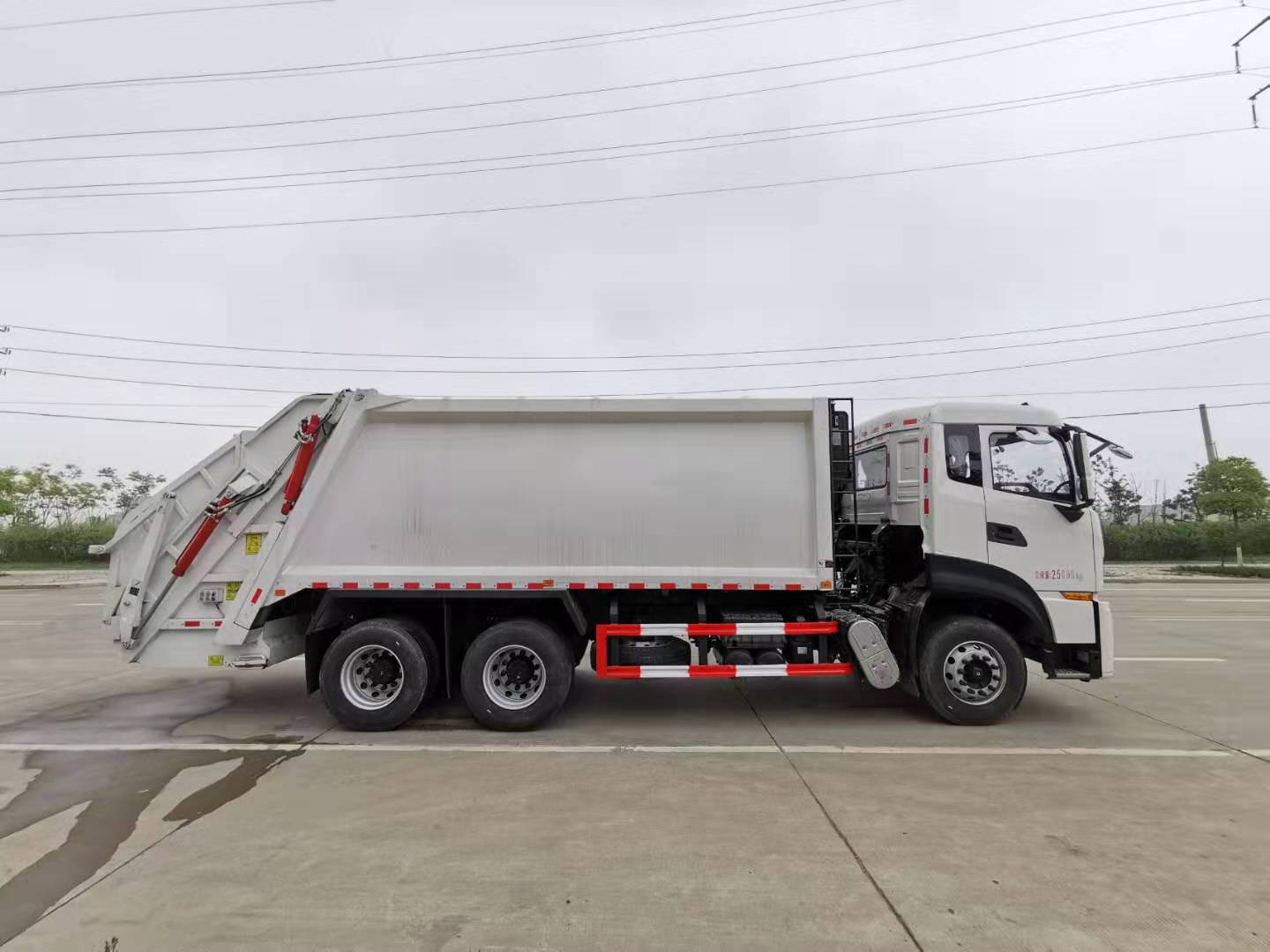 18立方东风天龙后双桥压缩垃圾车